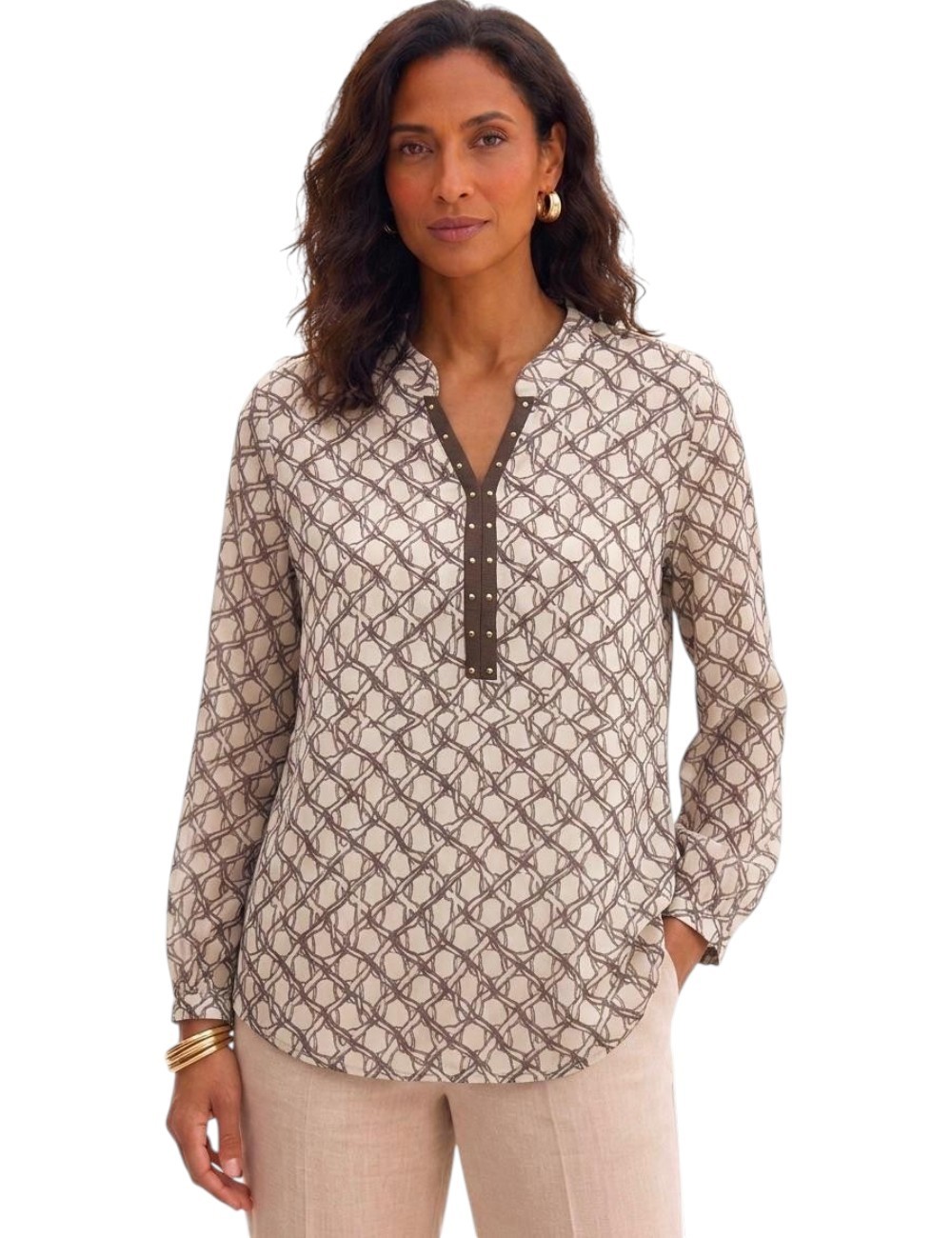 BLUSA MANGA LARGA ESTAMPADO GEOMÉTRICO CON TACHAS